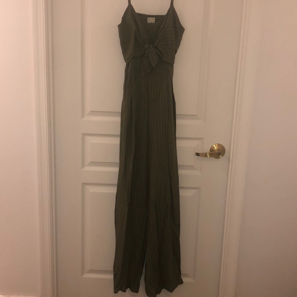 Green & white play suit w/ open back, never worn